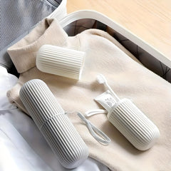 Travel toothbrush cases packed in a suitcase