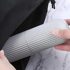 Travel toothbrush case going into a bag