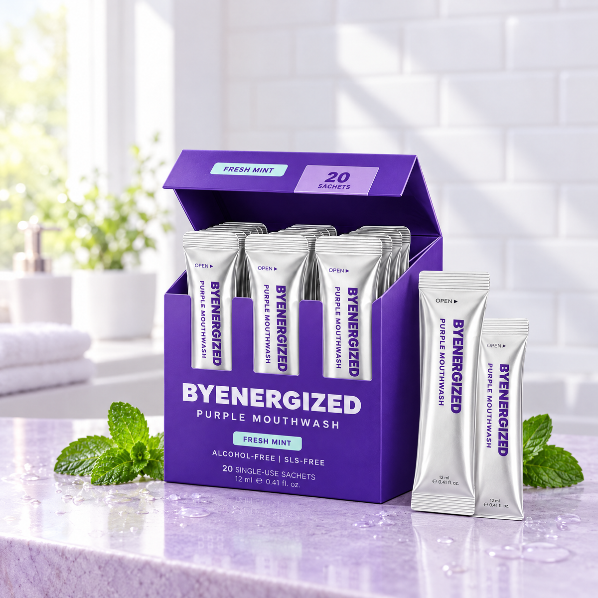 Byenergized Purple Mouthwash box open with silver single-use sachets on a lavender bathroom counter with fresh mint